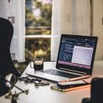 MacBook Pro on white table